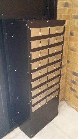 Secure by Design accredited mailbox unit with numbered slots, designed for enhanced security in residential and commercial properties.
